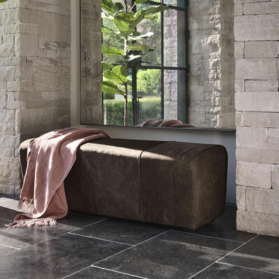 With its slim width, the Phoebe bench is great at the end of a bed, as extra seating in a living area or in an entry or hallway. Inspired by a gymnast’s pommel horse, it comes in two widths and is customizable in fabric or leather.