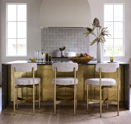 From the Remy collection, elegant and comfortable curved-back counter stools in soft, textural Kravet fabric Flaught, available in multiple colors. Remy is customizable in four finishes and in fabric or leather.