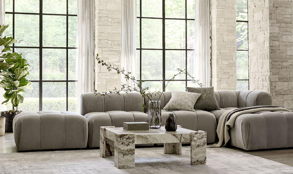 From the modular Roscoe collection, the five-piece sectional. With it, the onyx Petra coffee table.