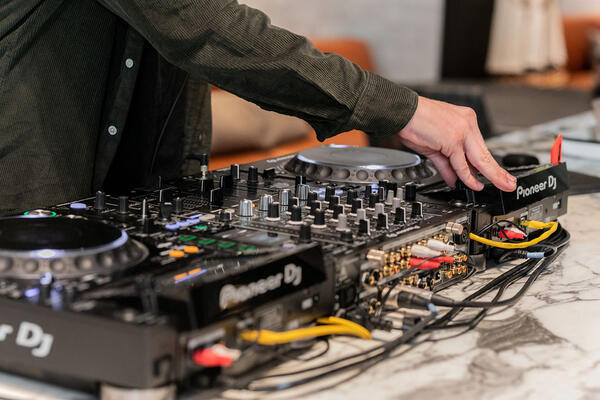 A DJ played music for Coco Republic’s San Francisco showroom opening party.