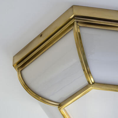 Art deco–style banding pairs beautifully with the opaline glass center of the Pennington flush ceiling light.
