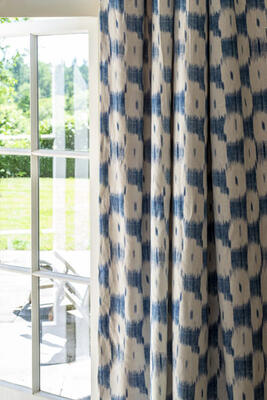 Patmos’ simple geometric design, printed in blue and white on 100 percent natural linen, is based on an 18-century textile.