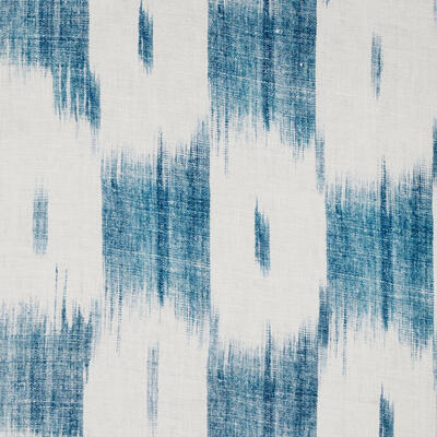 Patmos’ blue-and-white printed design complements the natural linen background.