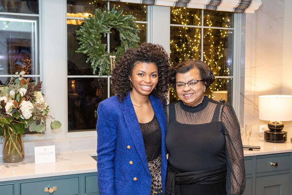 Amber Guyton of Blessed Little Bungalow, who designed the scullery, pantry and powder room, is pictured with her mother, Leveta.