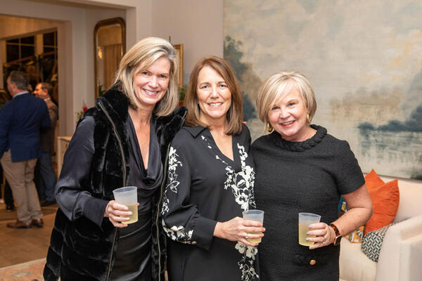 Wren Caples, Heather Parker and Trudy Stump of Huff Harrington Design, who designed the private office suite