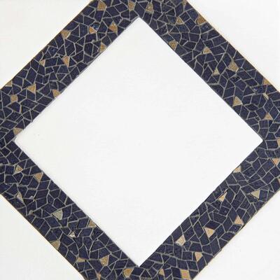 Avenue, a hand-cut stone mosaic shown in venetian honed Thassos, tumbled Indigo and polished Aurum, is part of the Heritage collection by New Ravenna.