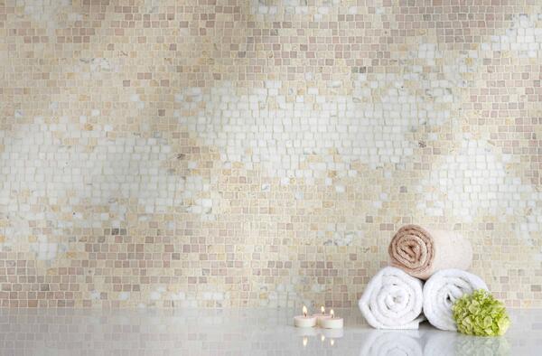 Dawn Mist, a hand-chopped stone mosaic shown in tumbled Calacatta Monet, Travertine White, Jerusalem Gold and Rosa Portogallo, is part of the Heritage collection by New Ravenna.