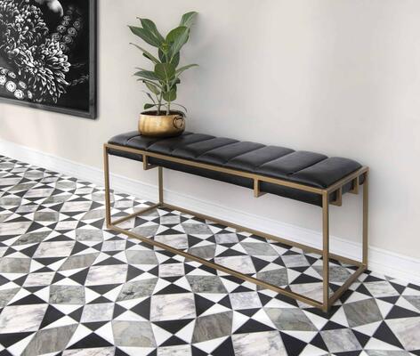 Palatium, a water-jet stone mosaic shown in honed Orpheus Black, polished Dolomite, Oyster and Lavender Mist, is part of the Heritage collection by New Ravenna.