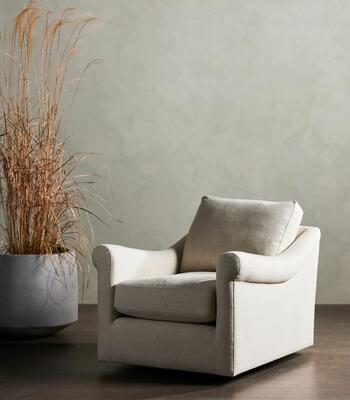 The Bridges swivel chair in natural Belgian-made, Libeco-sourced linen