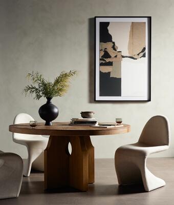 Paired together, the Allandale round dining table and Briette dining chairs subtly echo the colors and composition of “Poetic Architectures No 5” by Valeria Sidañez.