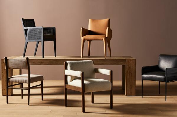 All-new dining chairs for winter 2023 encircle the Abaso dining table.