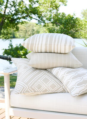 Cushion in Rimini woven fabric, pillows in Pintado Stripe, Ebro Stripe, Saraband and Terraza woven fabrics