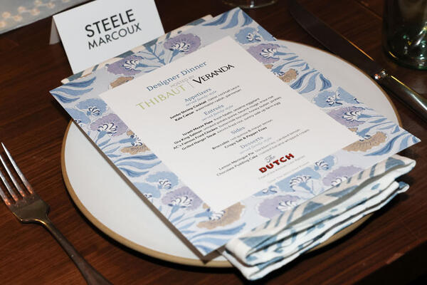 The four-course menu, framed by a new Thibaut floral print, Tybee Tree