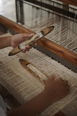 Dockside on the loom: Shades are handwoven to size, up to 180" wide.