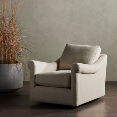 Traditional styling gets a modern spin: The Bridges swivel chair is designed with classic rolled arms and tightly tailored upholstery in naturally soft, durable Belgian linen. 