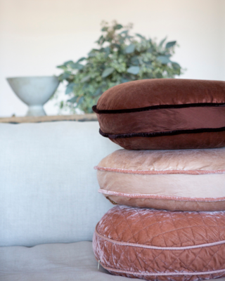 Stack of three 18-inch-diameter round pillows in Charmeuse and Silk Velvet Quilted
