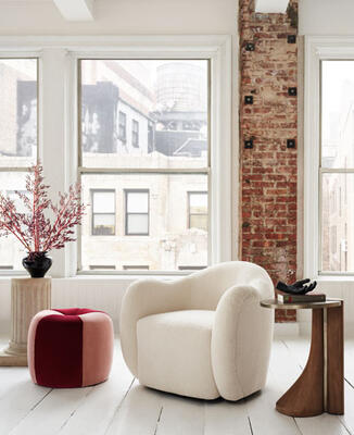 From the Rafael de Cárdenas for MG+BW Home collaboration: Sunbeam swivel chair, shown in Ivory performance faux shearling, Lily pouf in Kravet Ford velvets in Maroon and Blush, Lotus three-leg side table 