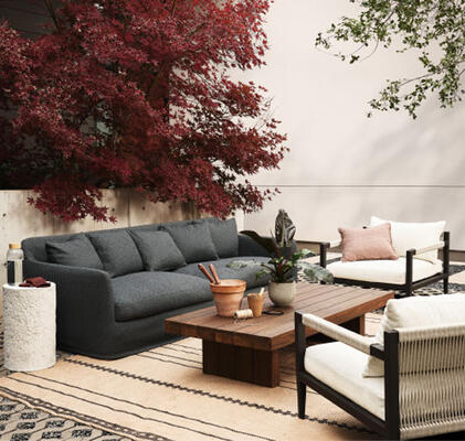 Style a space you feel good about: Consider the Dade outdoor sofa and Encino outdoor coffee table, both made of FSC-certified wood, and the Sherwood outdoor chair in fully recyclable Fiqa performance fabric