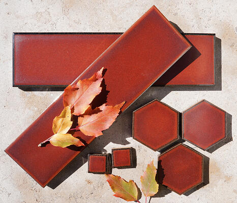 Godai series glazed porcelain in assorted formats in Plum Red from the Zen+Clay collection, Heritage Tile