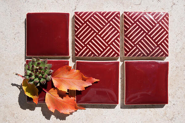 Hanakago series glazed porcelain in weave and pillowed field tile in Brick from the Zen+Clay collection, Heritage Tile