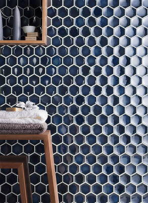 Godai series glazed porcelain concave hex in Midnight Blue from the Zen+Clay collection, Heritage Tile