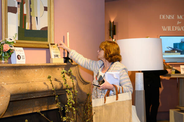Meg Fox browses the Wildwood showroom, which includes an adoquín mantel from the Denise McGaha for Materials collection
