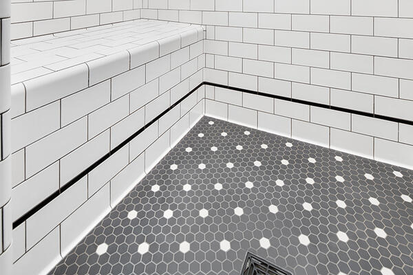A made-to-order mosaic in unglazed porcelain from Subway Mosaics, featuring a personalized design service, a 24-color palette and unlimited creative possibilities. A Heritage Tile collection