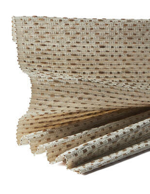 Rugged wicker baskets used by anglers to carry fish inspired this limited-edition windowcovering series. Woven on a jacquard hand-loom, Creel’s cream-colored ramie ground is punctuated with hand-placed contrasting patches of soft brown water hyacinth fibers in a rhythmic interplay of texture and tone