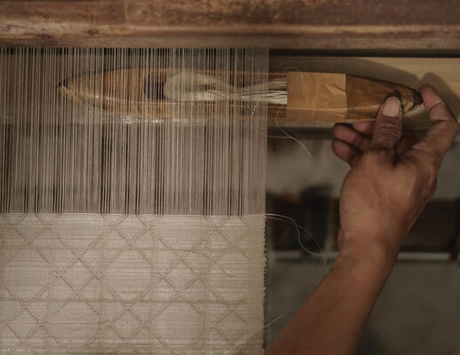 Canework on the loom: Shades are hand-woven to the size of the window