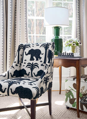 Draperies in Kisment Stripe. Hayden Dining chairs in Elephant Velvet fabric. Fair & Square Ottoman in Matisse leaf printed fabric with Keaton Cord. 