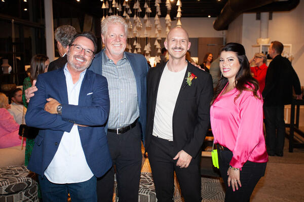 Michael Rhodes of Ferguson, Matt Adams of Fisher & Paykel, Brian Brown, and Anna Lancaster of Fisher & Paykel