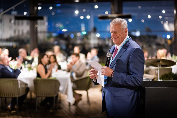 Co-founder Keith Granet addressing the members during the opening night dinner at the Mamila Hotel in Jerusalem