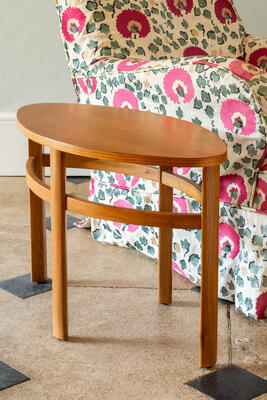 Based on an arts and crafts aesthetic, the low, oval Yately side table is a classic design with pared-back simplicity