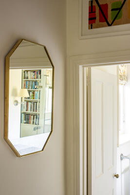 The Shawford mirror is a classic yet modernist design with cut corners and brass beading