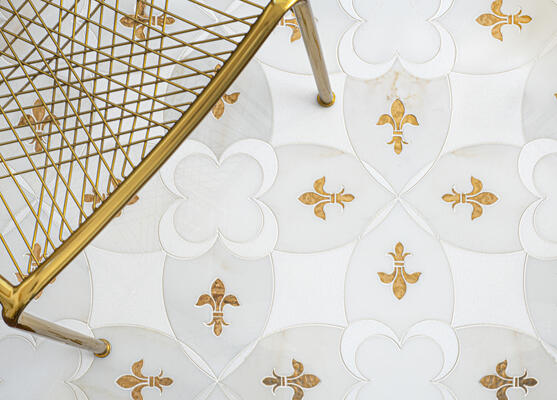 Ile Saint-Louis, a waterjet stone mosaic shown in polished Thassos, Calacatta Monet and 24-karat gold glass, is part of the Ville Lumière collection by Caroline Beaupère