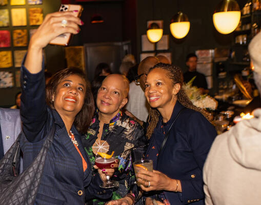 Sheila Bridges (center) and Diane Moss (right) pose for a selfie