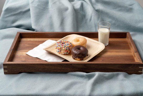Our modern wooden tray was created for lazy Sundays spent reading the paper with coffee and scones, but it would be perfect to use for hosting an afternoon tea, or as barware to pass out drinks at a cocktail party. 