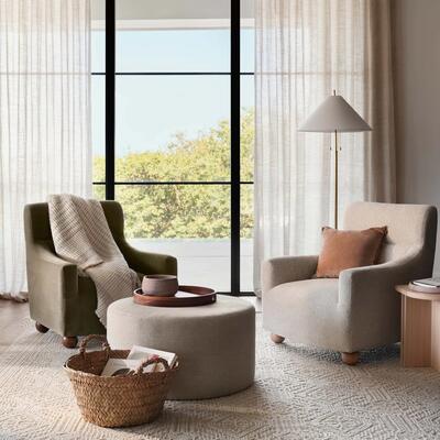 Vale armchair and Bower ottoman in Crypton Home performance fabric