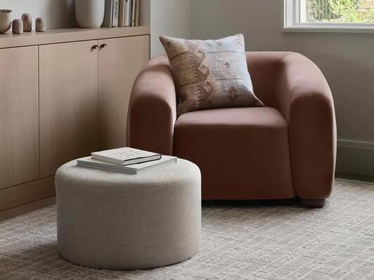 Bay armchair and Bower ottoman in Crypton Home performance fabric