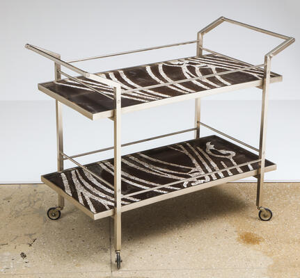 Kent bar cart: Symmetry and classic lines serve to anchor a living space, while a mixture of materials gives a graceful airiness to this substantial piece. (Casters for decorative use only)