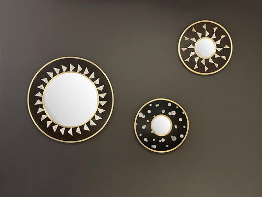 The Jules collection: Inspired by Jean Dunand’s timeless artistry, these mirrors are meticulously crafted from an archive of resin-cured eggshell remnants, infusing each piece with a touch of the studio’s history. De La Vega’s ingenuity shines through the sunrays, champagne bubbles, geometrics and art deco motifs that captivatingly encircle the mirrors. Cast in durable resin, delicately trimmed with bronze and offered in three sizes, the Jules collection exudes both luxury and versatility