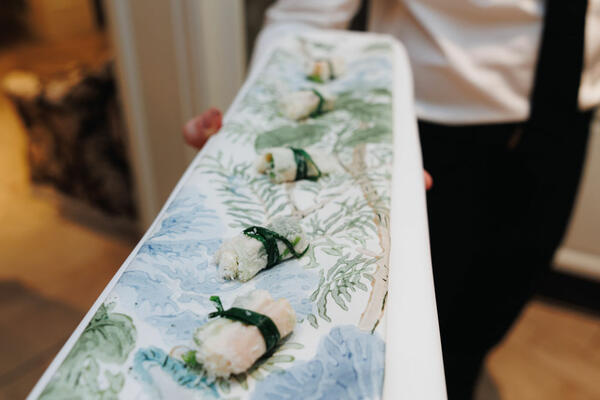 Hors d’oeuvres displayed on Lee Jofa anniversary fabric
