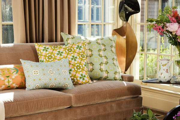 Accent pillows in English Garden patterns include (left to right): English Garden Orange, Dorset Garden Blue, Lady Di Yellow, Primrose Blue