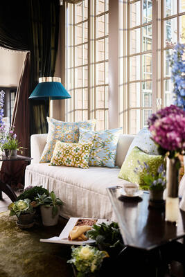 Accent pillows in English Garden patterns include (left to right): Chelsea Orange, Lady Di Yellow, English Garden Citron, English Garden Blue, Dorset Garden Blue, English Garden Citron