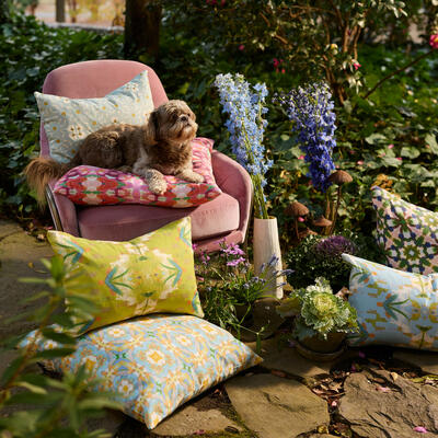Accent pillows in English Garden patterns include (left to right): English Garden Gray, Rose Hill Cottage, English Garden Citron, Chelsea Orange, English Garden Blue, Lady Di Blue