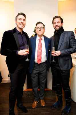 Designers Wesley Moon and Tyler Banken with Business of Home’s Dennis Scully (center)