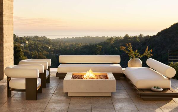 Bondi seating in all-weather aluminum shown with the Ixtapa plinth fire table