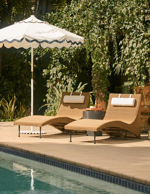 The Marisol chaise reimagines wicker seating with its sculptural form, contoured for comfort