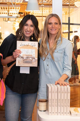 Lauren Liess (right) signed copies of her new book