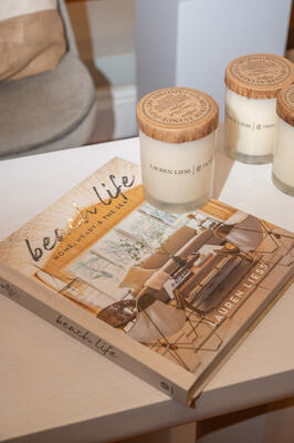 Gifts included Lauren Liess’s new book, “Beach Life,” and a complementary scented candle